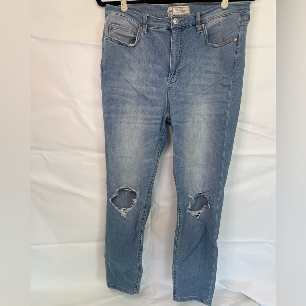Free People Women's Skinny Jeans in Light Blue with Knee Rips